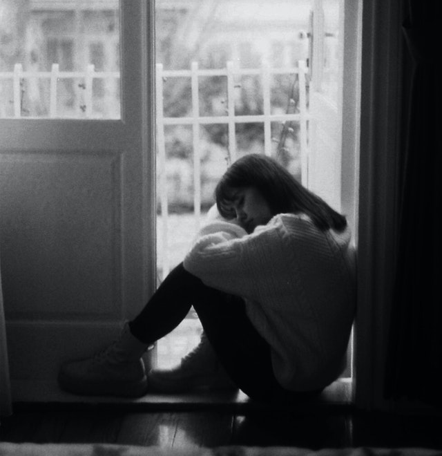 A woman reflecting on her emotions